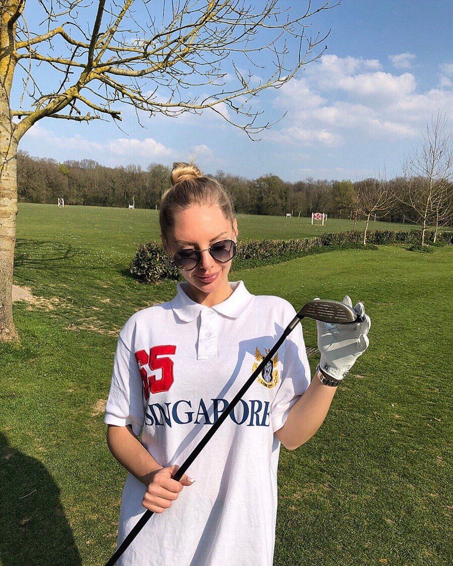 Daria Nesterova on a golf course